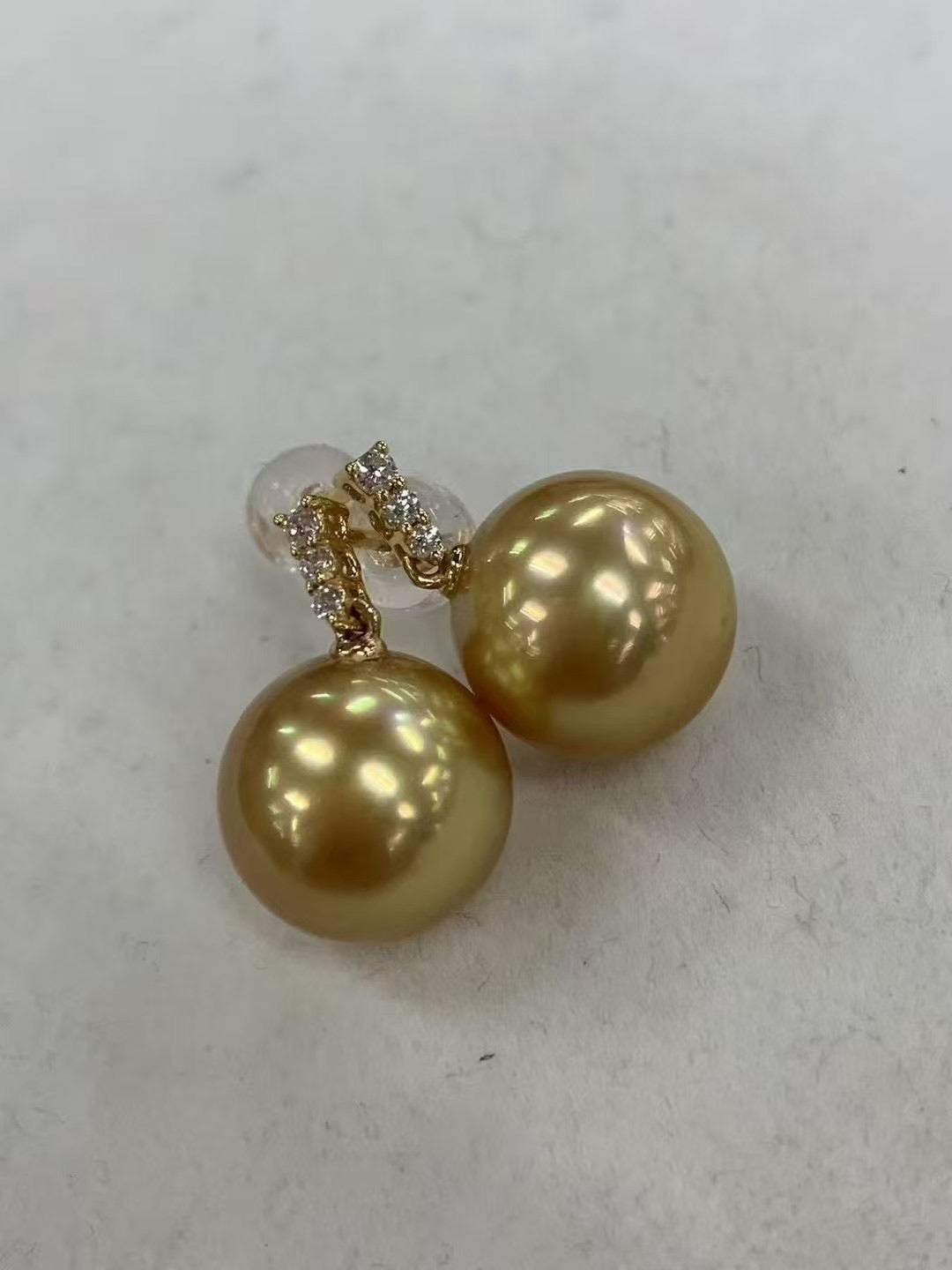 Golden 11.2 mm South Sea Pearl & Diamond Earrings – Classic Three-Diamond Design