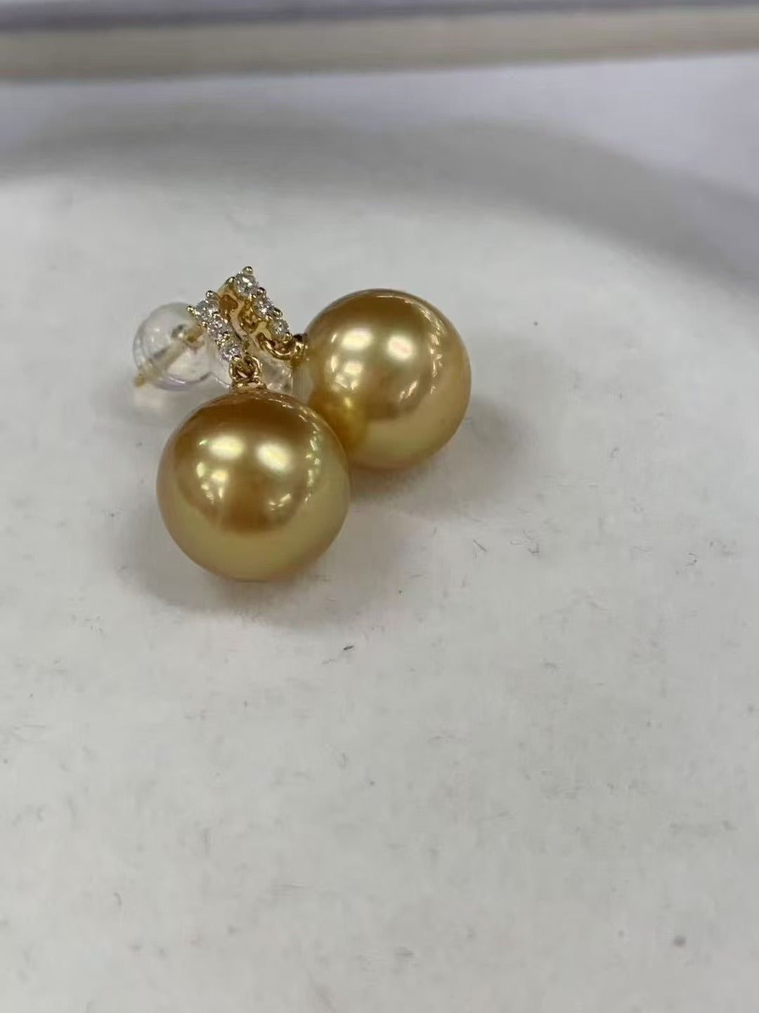 Golden 11.2 mm South Sea Pearl & Diamond Earrings – Classic Three-Diamond Design